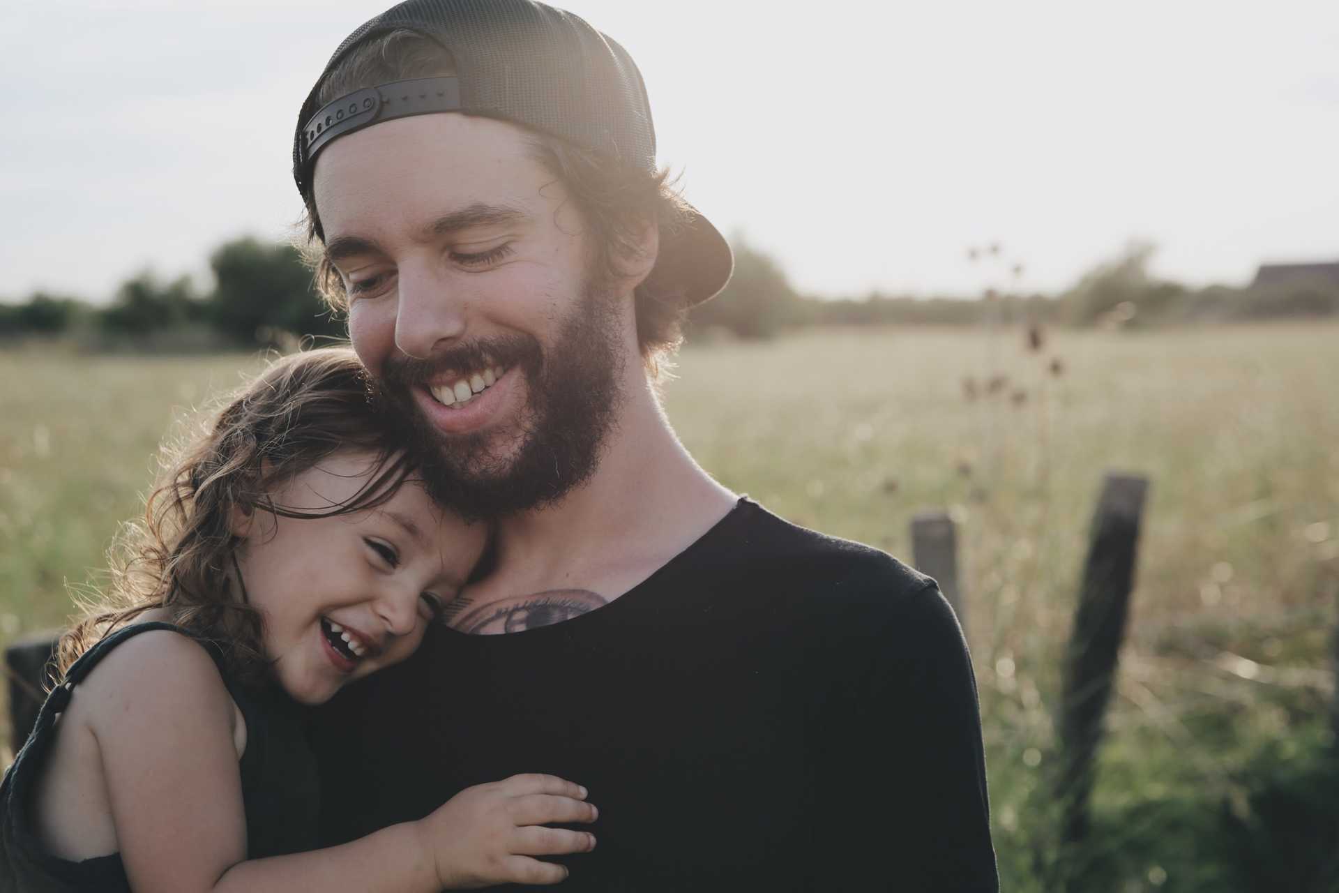 Father hugging daughter